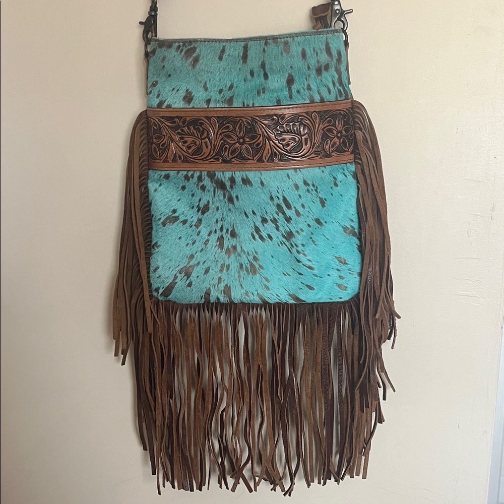 American Darling Turquoise and Brown Fringe Bag
Genuine leather